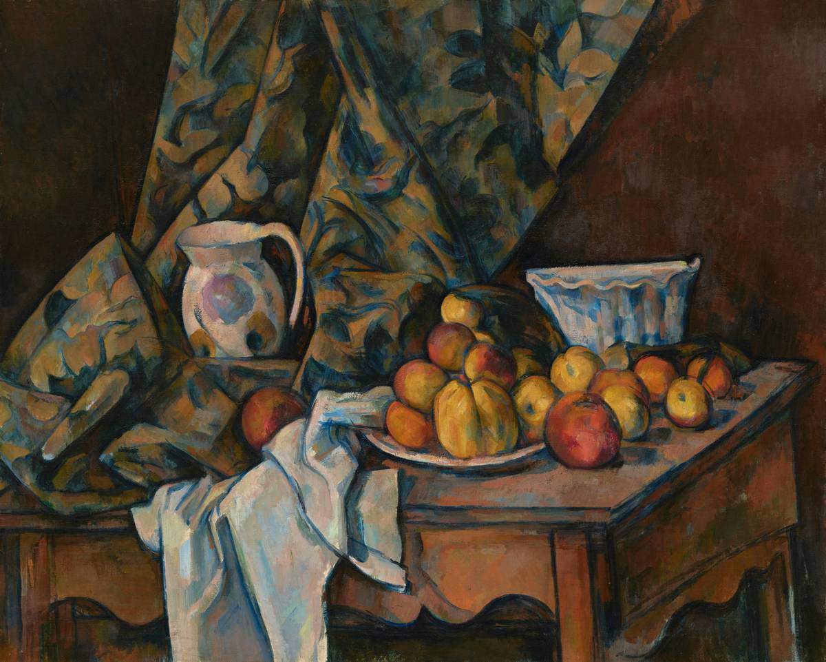 Authentic vintage still life paintings displayed in a cozy study with warm lighting